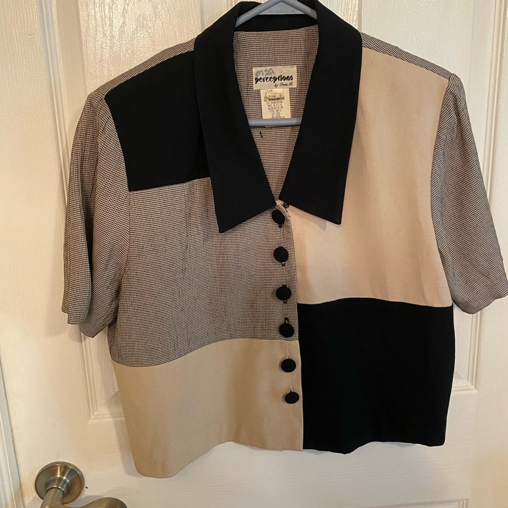 Woman’s short jacket/top